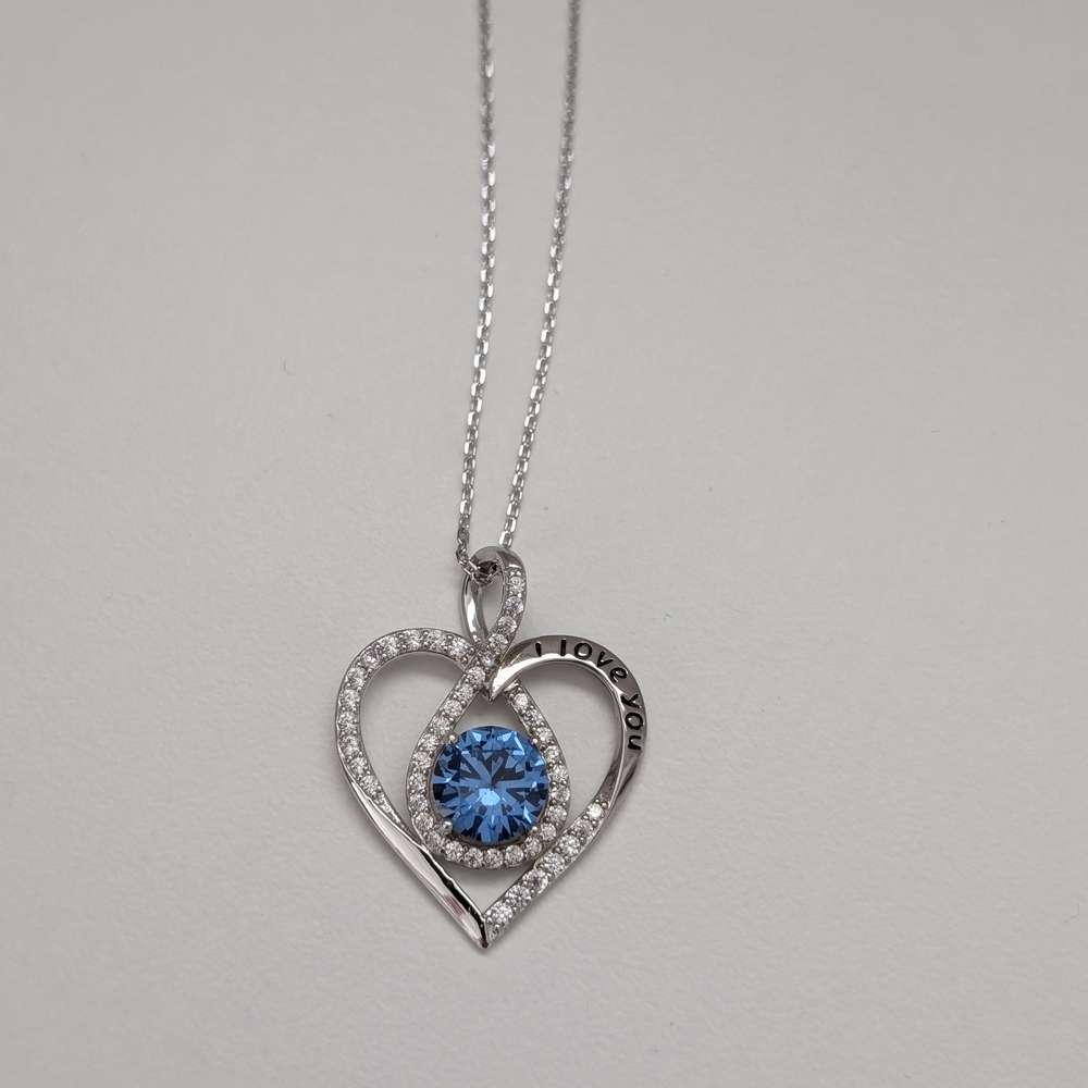 Elegant Silver Heart Necklace with Blue Gemstone